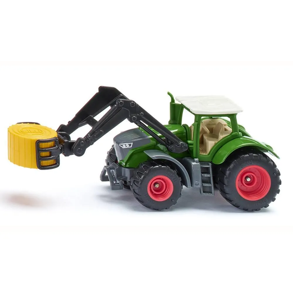 TRACTEUR FENDT AVEC PINCE À BALLES